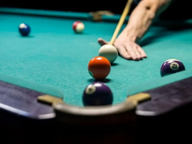Playing billiards on an MDF table