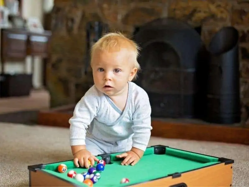 Baby on pool table