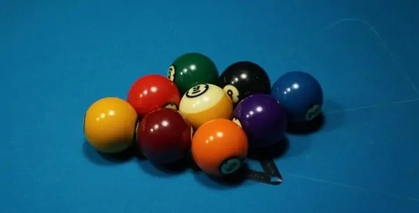 A racked set of billiard balls for 9-ball