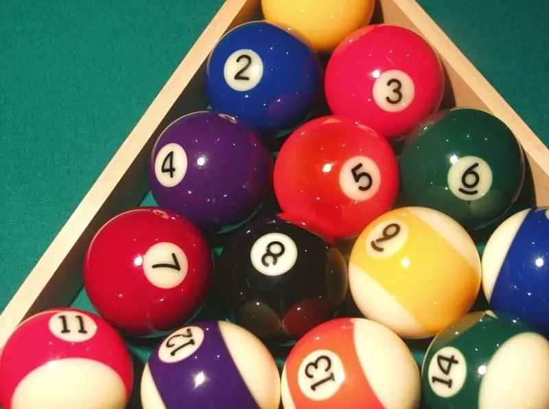 Why Do Cue Balls Have Red Dots?