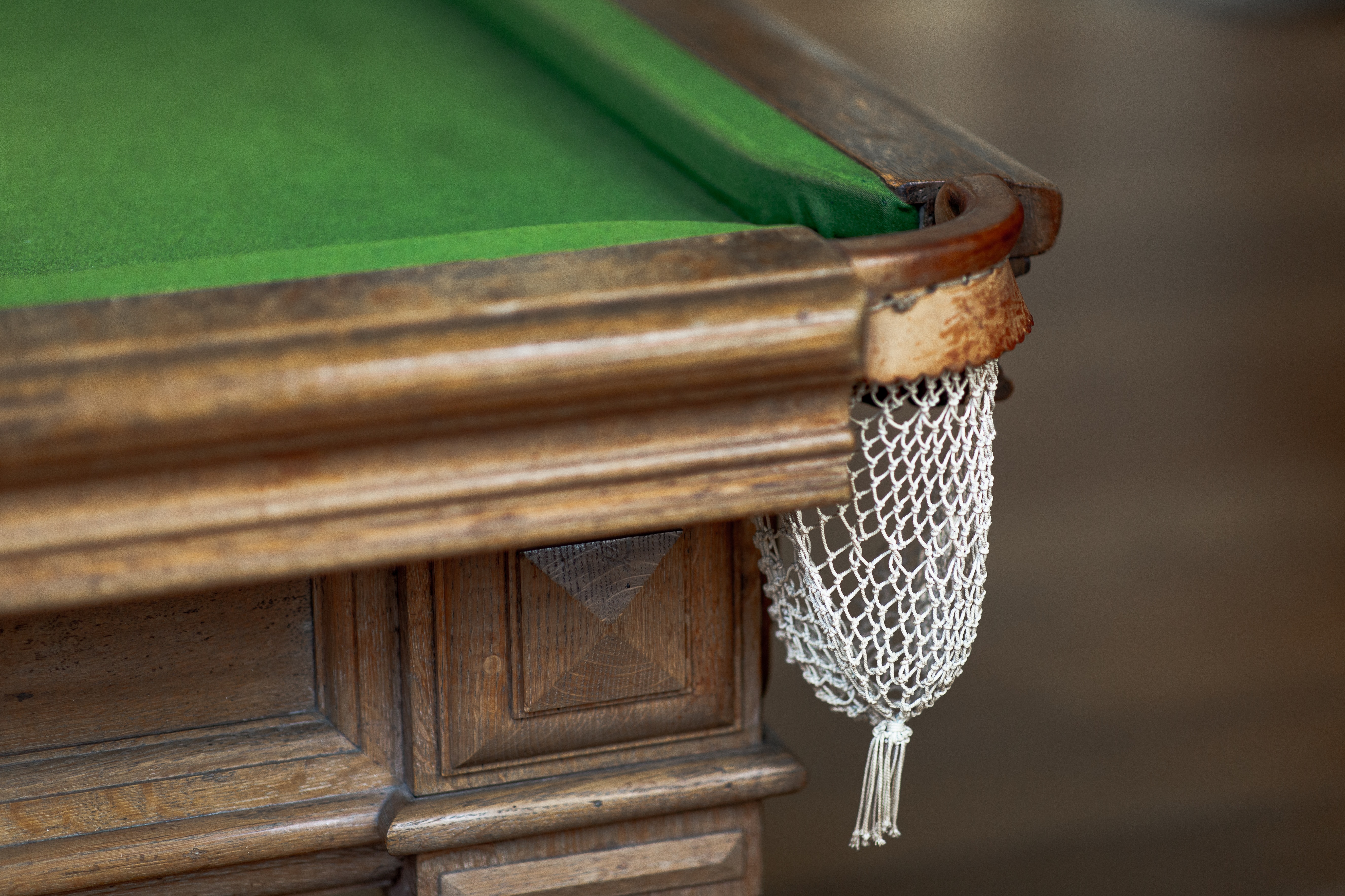 Close-up of the corner of a fine billiard table