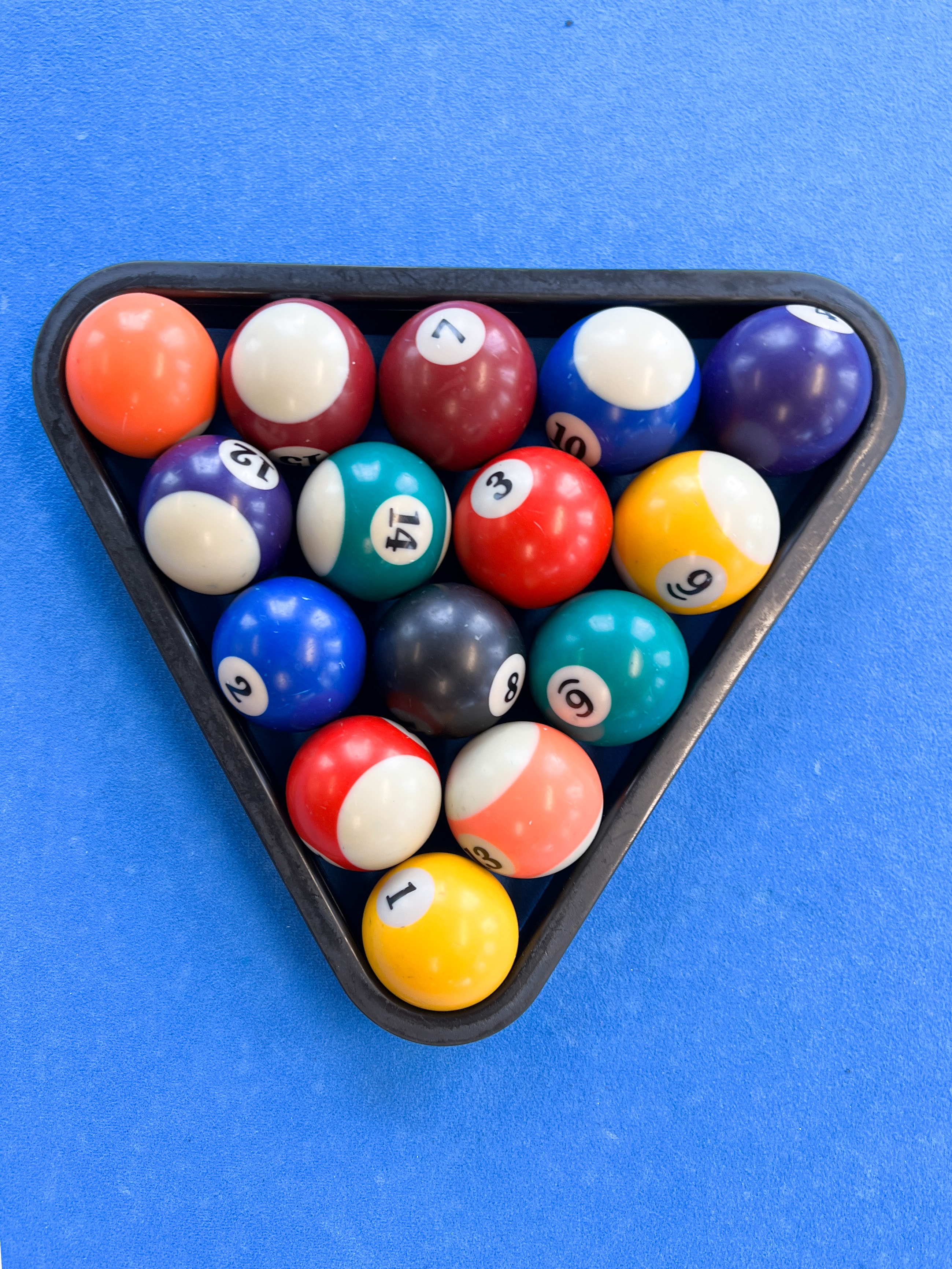 A racked set of pool balls