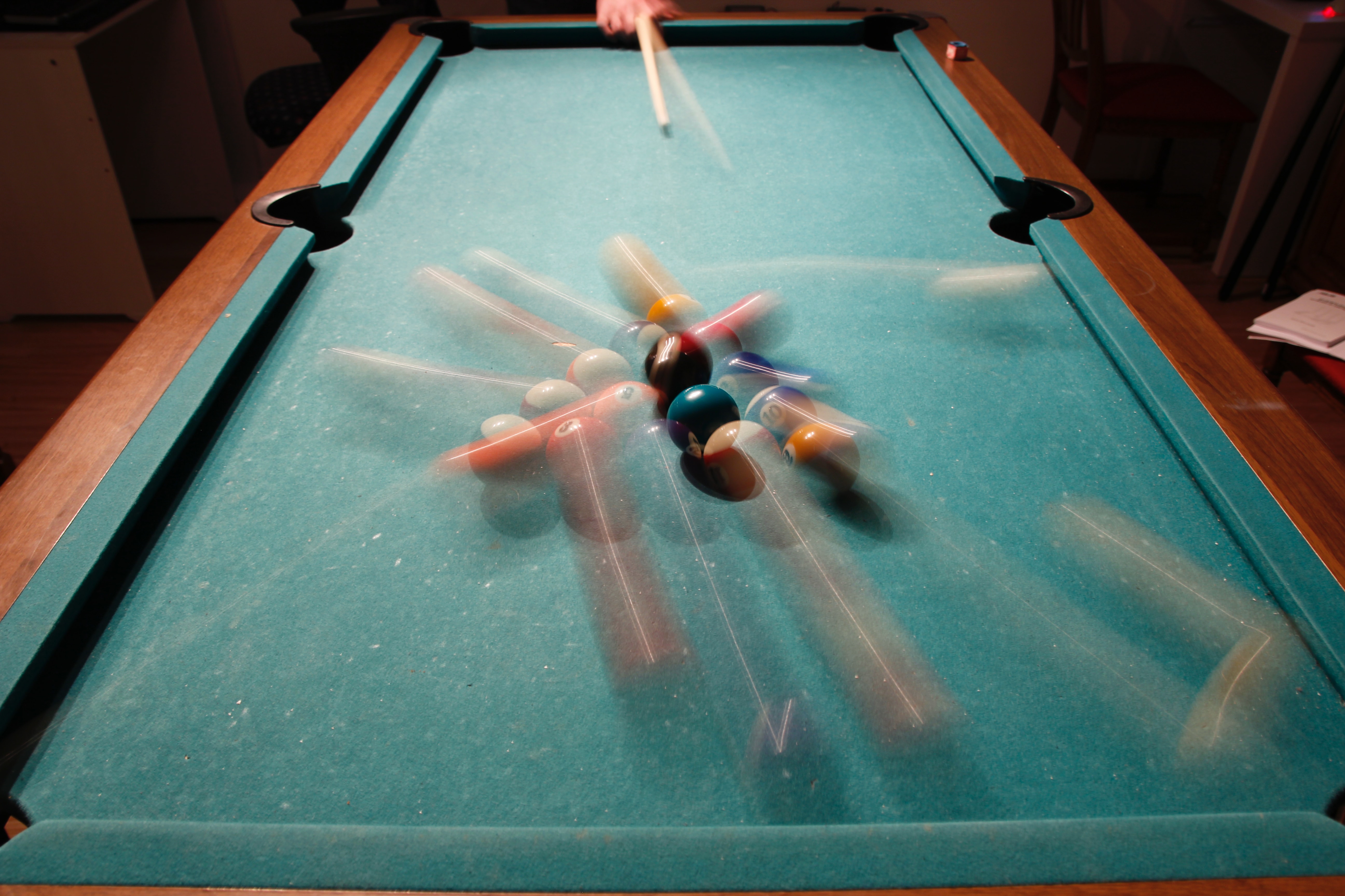 Time lapse photo of billiard balls on a table