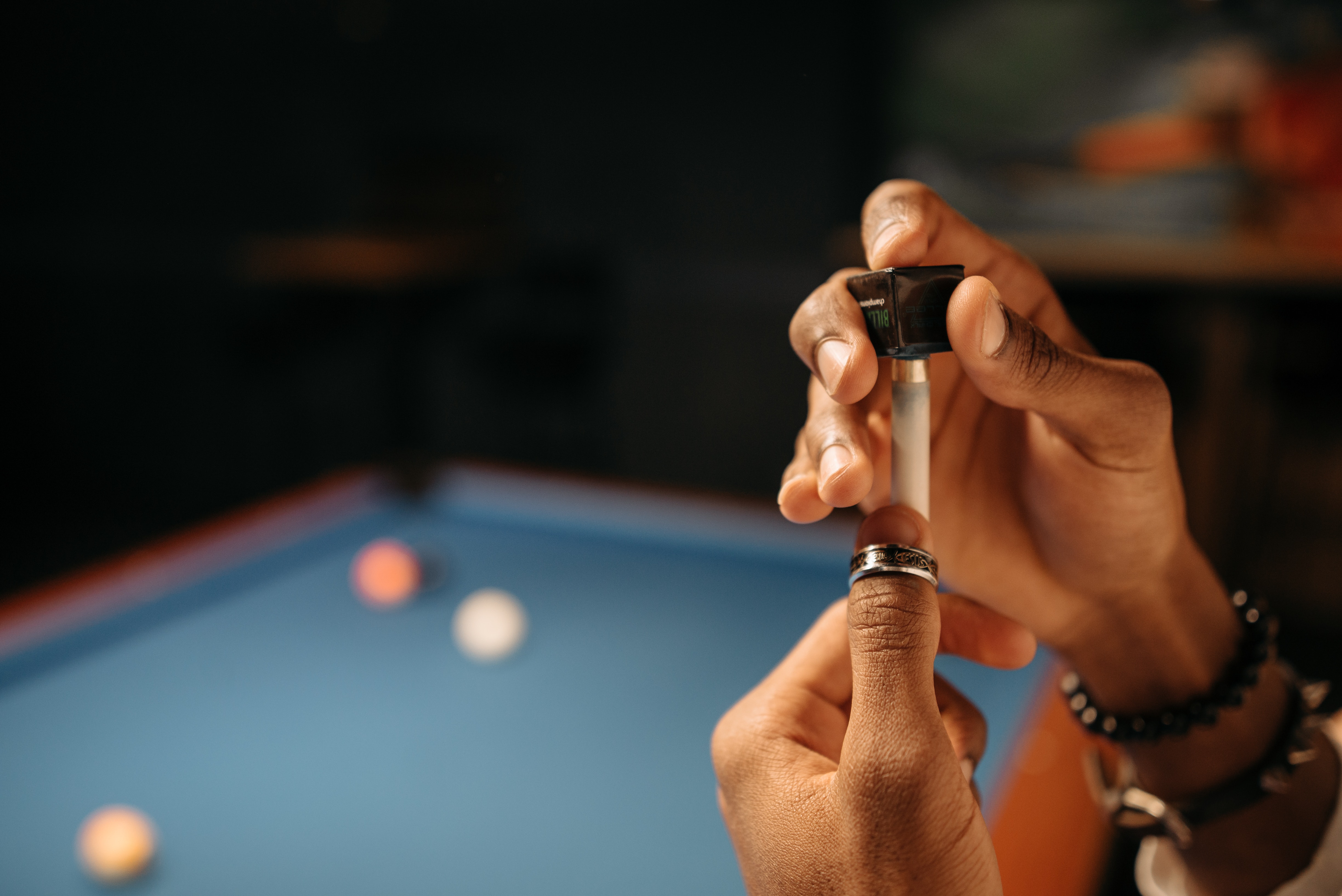 Player chalking a cue